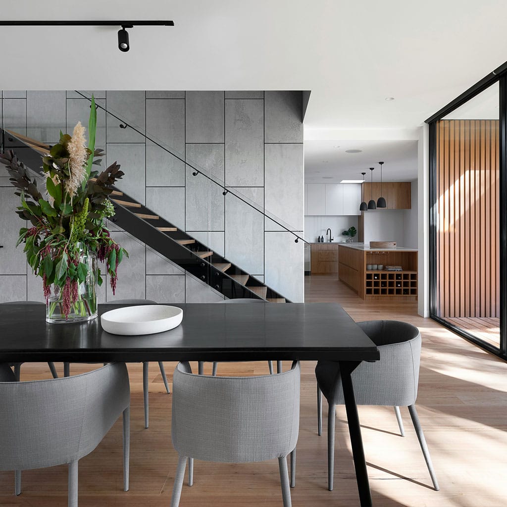 Modern open-plan dining room interior with sleek design and minimalist decor in Milton Keynes, UK.